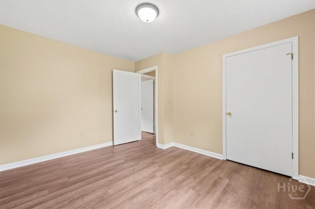 310 Ashmore St Unit A, B, Hinesville, GA 31313 - unfurnished bedroom featuring light wood-type flooring and baseboards
