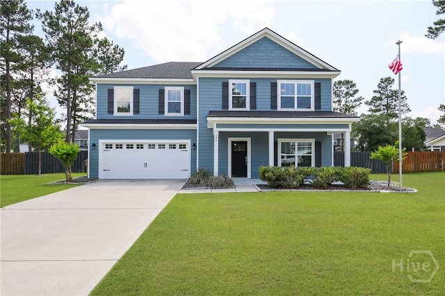 194 Shortleaf Trl, Richmond Hill, GA 31324 - view of front of property with a garage, driveway, and a porch