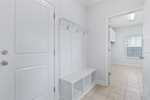 194 Shortleaf Trl, Richmond Hill, GA 31324 - mudroom with light tile patterned floors and baseboards