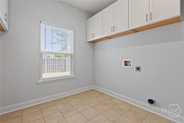 194 Shortleaf Trl, Richmond Hill, GA 31324 - washroom with hookup for an electric dryer, cabinet space, washer hookup, baseboards, and light tile patterned floors