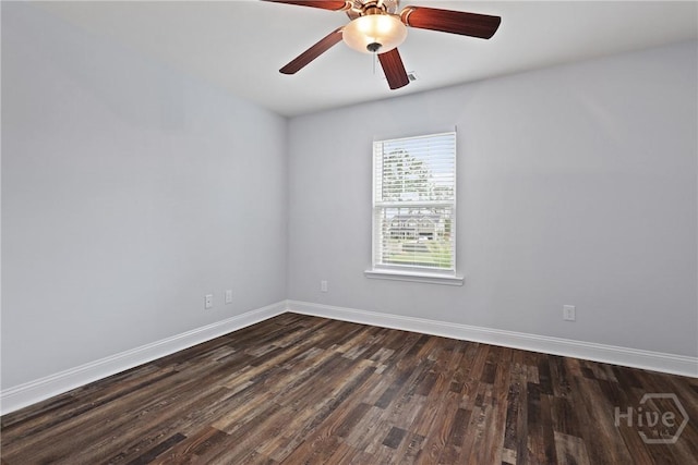 194 Shortleaf Trl, Richmond Hill, GA 31324 - empty room with dark wood finished floors, baseboards, and a ceiling fan