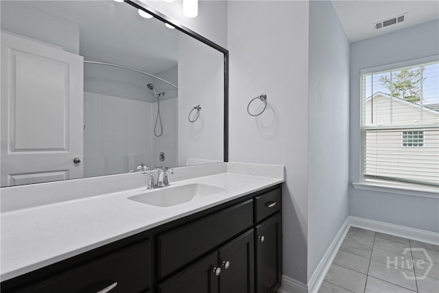 194 Shortleaf Trl, Richmond Hill, GA 31324 - full bath with vanity, baseboards, a shower, and tile patterned floors