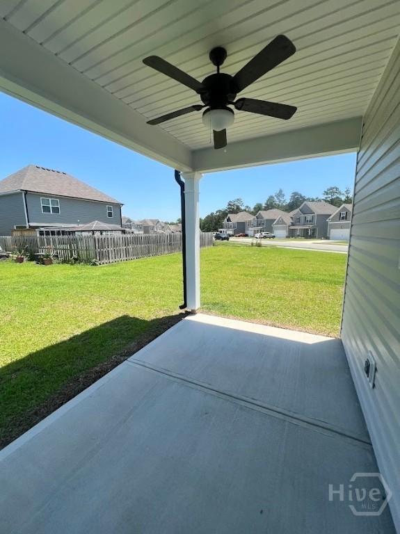 139 Sams Dr, Guyton, GA 31312 - view of patio / terrace with a ceiling fan and a residential view