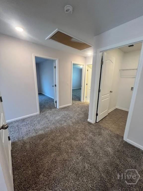 139 Sams Dr, Guyton, GA 31312 - carpeted spare room featuring attic access, baseboards, and a smoke detector