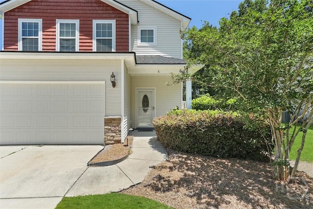 4 Crest View Cir, Pooler, GA 31322 - traditional-style home featuring concrete driveway, an attached garage, and stone siding