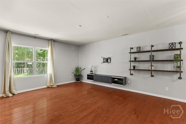 4 Crest View Cir, Pooler, GA 31322 - unfurnished living room featuring wood finished floors and baseboards