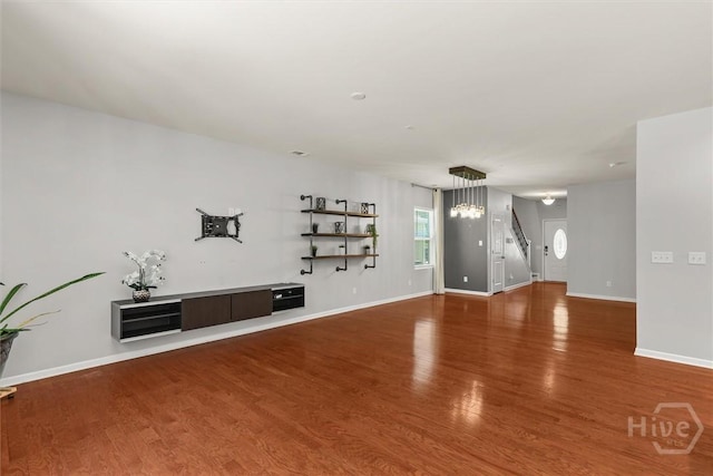 4 Crest View Cir, Pooler, GA 31322 - unfurnished living room featuring wood finished floors and baseboards