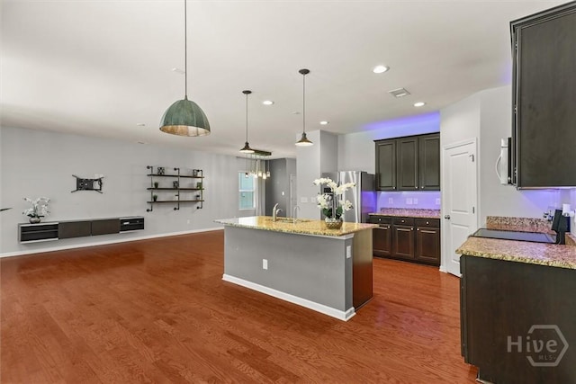4 Crest View Cir, Pooler, GA 31322 - kitchen featuring appliances with stainless steel finishes, dark wood-style floors, a kitchen island with sink, recessed lighting, and pendant lighting
