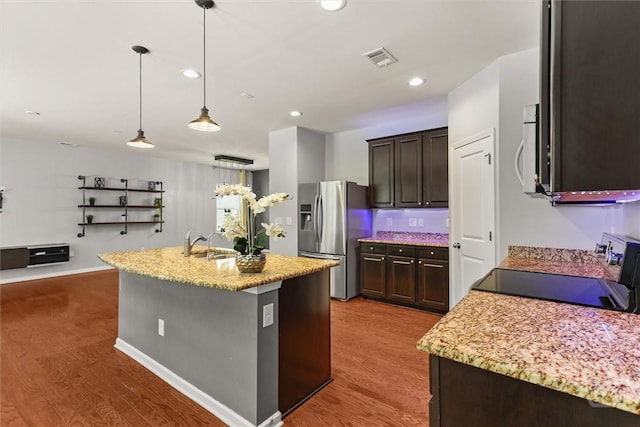4 Crest View Cir, Pooler, GA 31322 - kitchen with stainless steel appliances, a sink, wood finished floors, dark brown cabinets, and recessed lighting