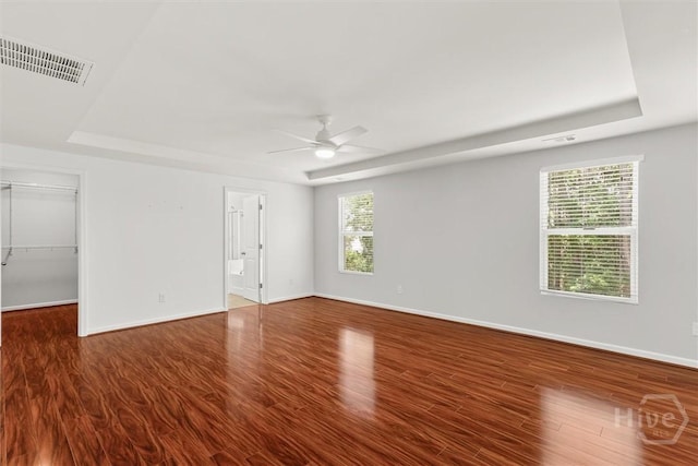 4 Crest View Cir, Pooler, GA 31322 - unfurnished room featuring wood finished floors, a raised ceiling, ceiling fan, and plenty of natural light