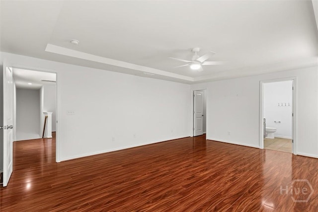 4 Crest View Cir, Pooler, GA 31322 - spare room with wood finished floors, a ceiling fan, a raised ceiling, and a smoke detector