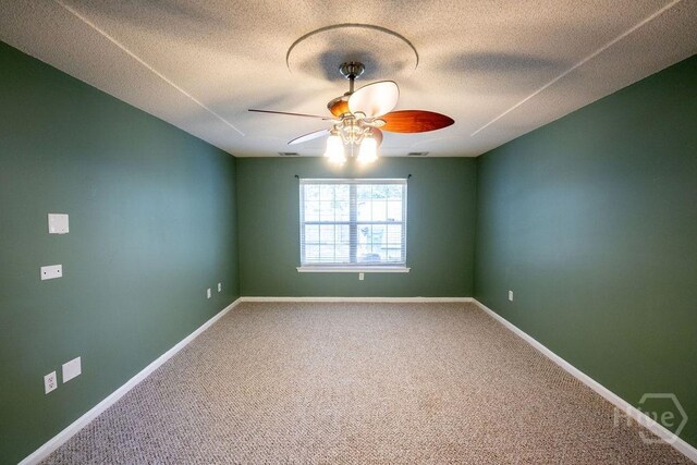 143 Village Lake Dr, Pooler, GA 31322 - carpeted empty room with a ceiling fan, baseboards, and a textured ceiling