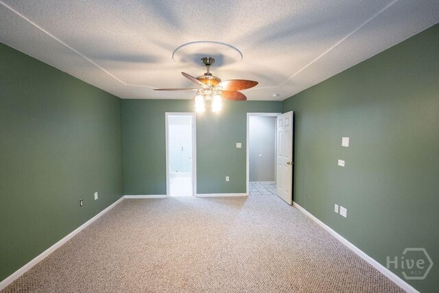 143 Village Lake Dr, Pooler, GA 31322 - carpeted empty room featuring ceiling fan, baseboards, and a textured ceiling