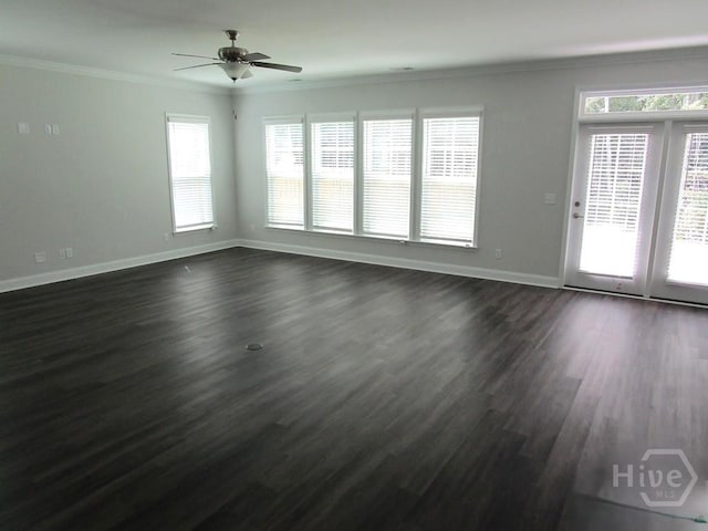 32 Brookhaven Dr, Savannah, GA 31407 - unfurnished living room featuring ornamental molding, a ceiling fan, baseboards, plenty of natural light, and dark wood-type flooring