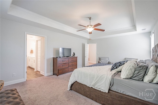 32 Brookhaven Dr, Savannah, GA 31407 - bedroom with a tray ceiling, light carpet, crown molding, a ceiling fan, and ensuite bathroom