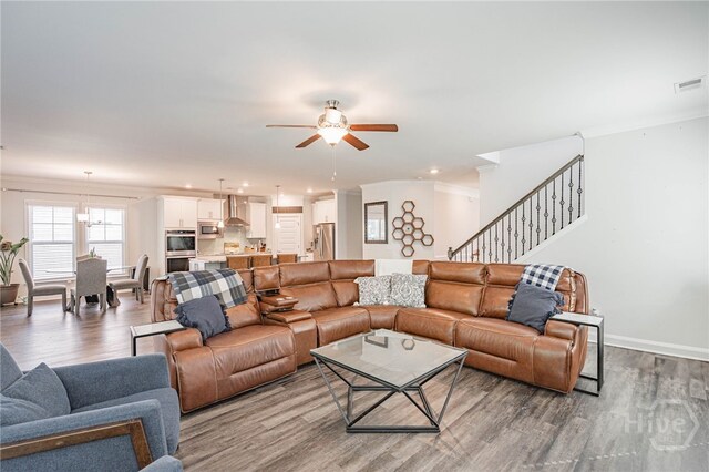 32 Brookhaven Dr, Savannah, GA 31407 - living area with wood finished floors, ceiling fan, stairs, ornamental molding, and recessed lighting