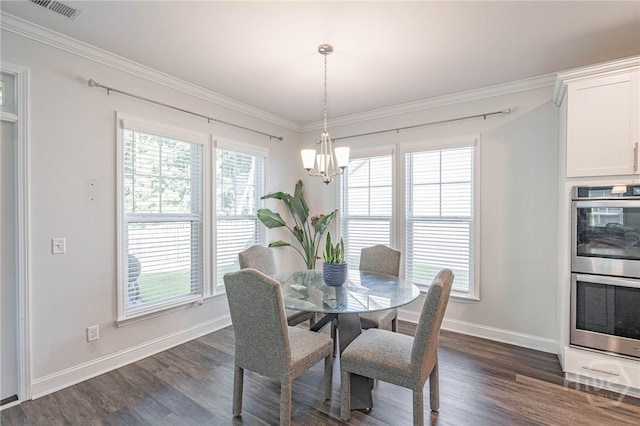 32 Brookhaven Dr, Savannah, GA 31407 - dining space featuring dark wood-style flooring, a chandelier, and ornamental molding