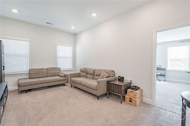 32 Brookhaven Dr, Savannah, GA 31407 - living room featuring light colored carpet, plenty of natural light, and recessed lighting