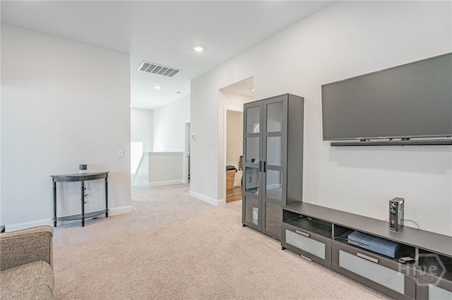 32 Brookhaven Dr, Savannah, GA 31407 - unfurnished living room featuring light colored carpet and recessed lighting