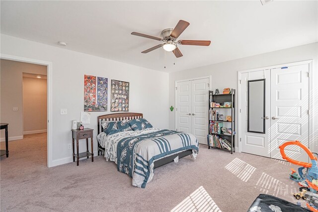 32 Brookhaven Dr, Savannah, GA 31407 - bedroom featuring carpet, a ceiling fan, and two closets