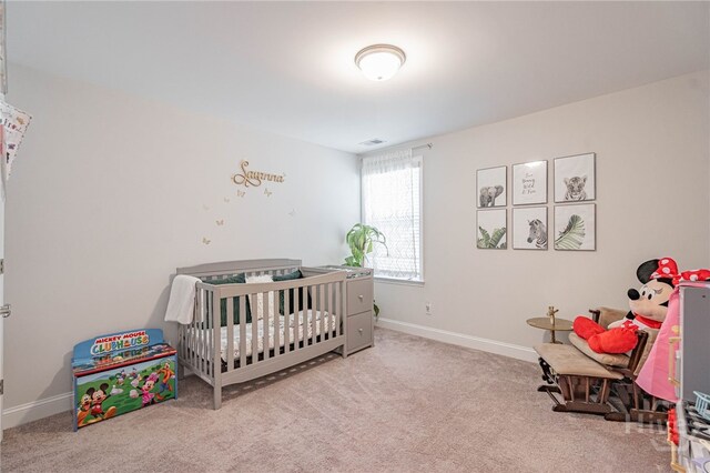 32 Brookhaven Dr, Savannah, GA 31407 - bedroom featuring carpet flooring and a crib