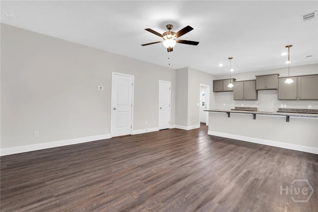 142 Guana Ln, Bloomingdale, GA 31302 - unfurnished living room with a ceiling fan, dark wood-type flooring, baseboards, and recessed lighting