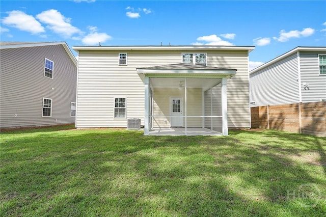 142 Guana Ln, Bloomingdale, GA 31302 - rear view of property with central AC unit, a patio area, and a sunroom