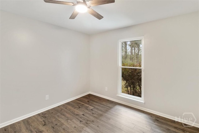4342 Mud Rd, Brooklet, GA 30415 - unfurnished room featuring baseboards, dark wood-style floors, and a ceiling fan