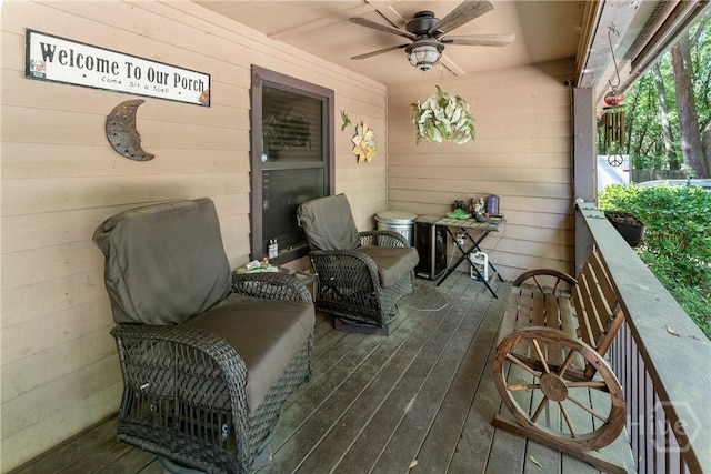 124 Denham Ln, Midway, GA 31320 - wooden deck with a ceiling fan