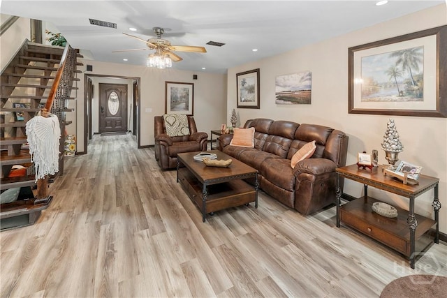 124 Denham Ln, Midway, GA 31320 - living room featuring a ceiling fan, light wood finished floors, recessed lighting, and stairs