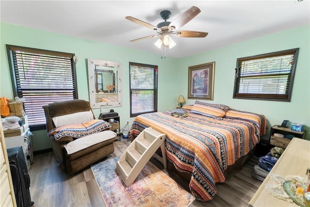 124 Denham Ln, Midway, GA 31320 - bedroom featuring wood finished floors and a ceiling fan