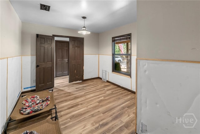 124 Denham Ln, Midway, GA 31320 - spare room with light wood-style flooring and baseboards