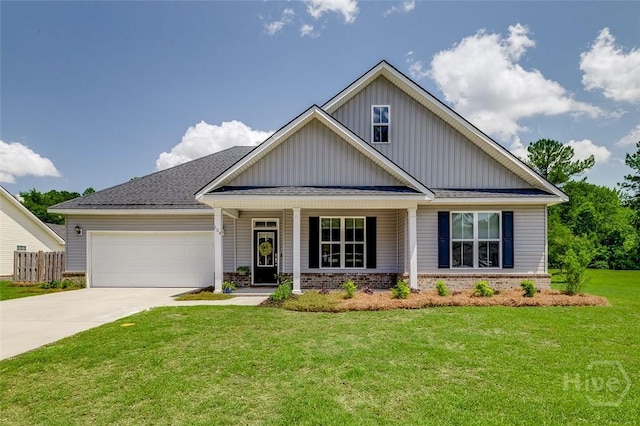 109 Amelia Ct, Guyton, GA 31312 - view of front facade featuring an attached garage, board and batten siding, brick siding, a front lawn, and driveway