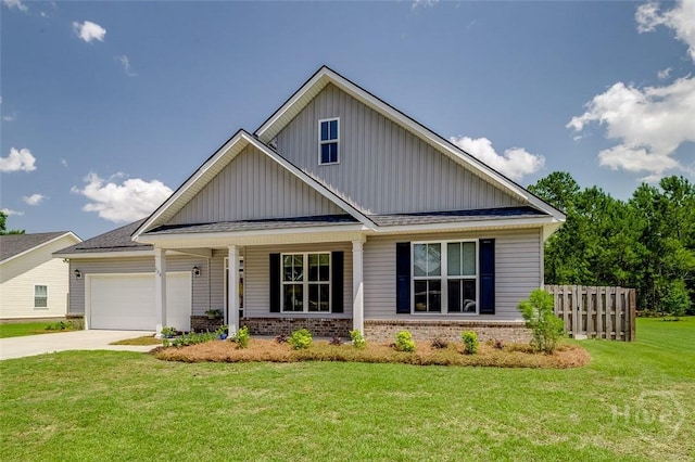 109 Amelia Ct, Guyton, GA 31312 - view of front of home featuring board and batten siding, a garage, brick siding, concrete driveway, and a porch