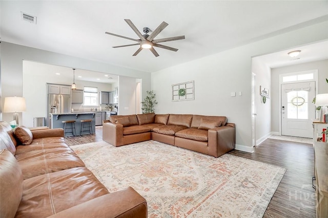 109 Amelia Ct, Guyton, GA 31312 - living room featuring a ceiling fan, wood finished floors, and baseboards