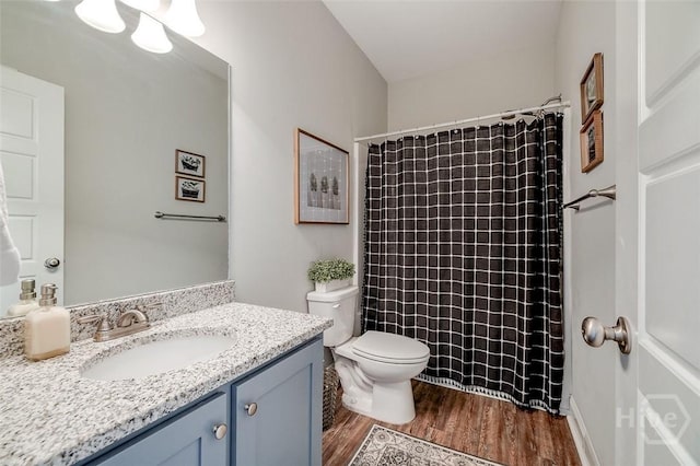 109 Amelia Ct, Guyton, GA 31312 - full bathroom featuring vanity, wood finished floors, toilet, and a shower with shower curtain