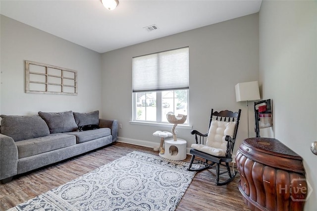 109 Amelia Ct, Guyton, GA 31312 - living room featuring wood finished floors and baseboards