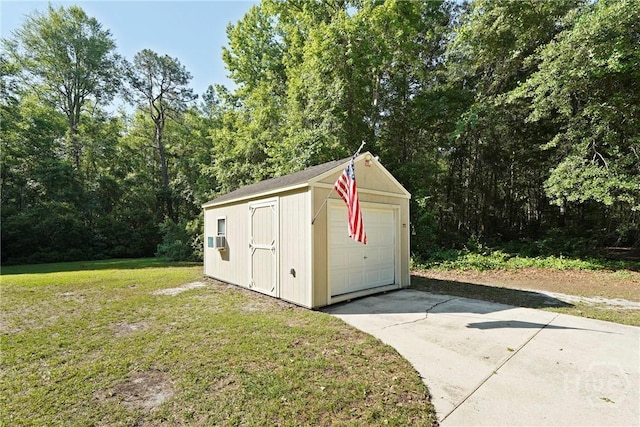 121 Warner Dr, Guyton, GA 31312 - view of outdoor structure featuring concrete driveway