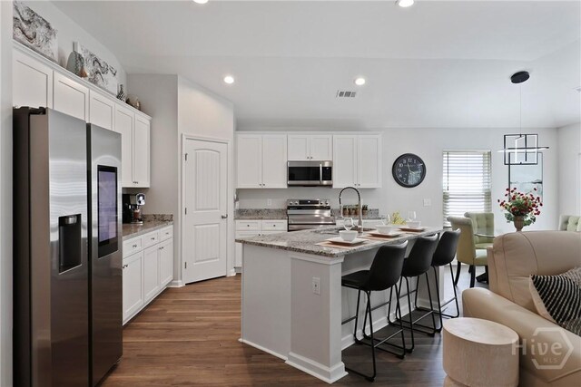 235 Cromer St, Savannah, GA 31407 - kitchen featuring stainless steel appliances, dark wood-style flooring, a sink, white cabinetry, and recessed lighting