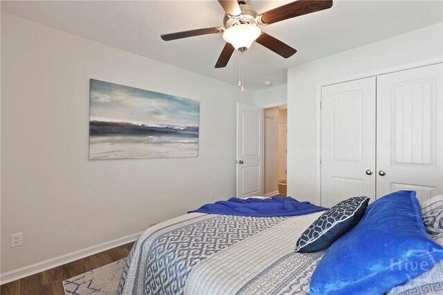 235 Cromer St, Savannah, GA 31407 - bedroom featuring baseboards, wood finished floors, a closet, and a ceiling fan
