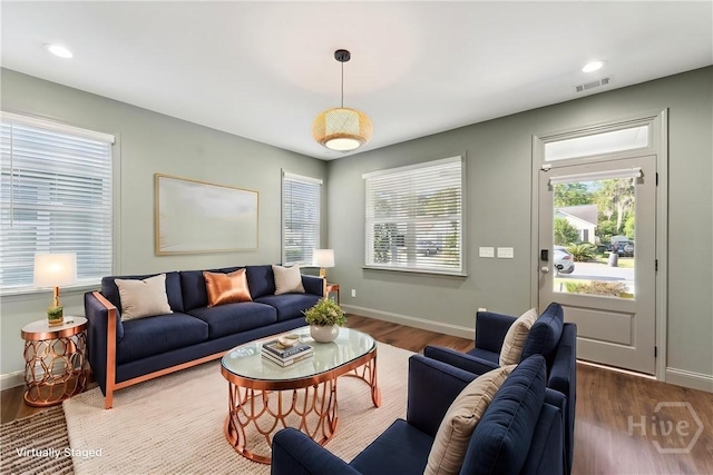 2142 New York Ave, Savannah, GA 31404 - living room with wood finished floors, baseboards, and recessed lighting