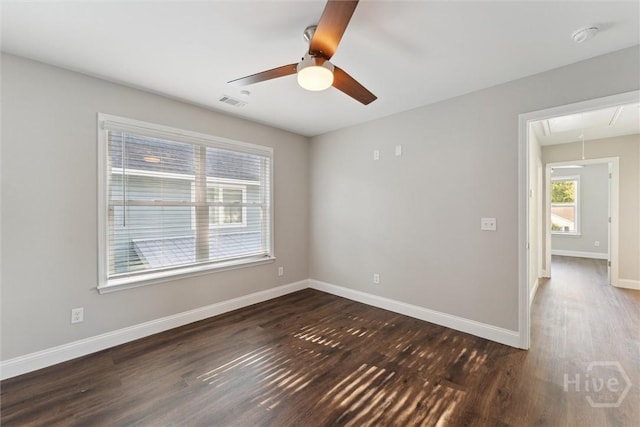 2142 New York Ave, Savannah, GA 31404 - spare room with attic access, dark wood-type flooring, baseboards, and ceiling fan