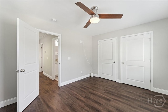 2142 New York Ave, Savannah, GA 31404 - unfurnished bedroom with baseboards, dark wood finished floors, and ceiling fan