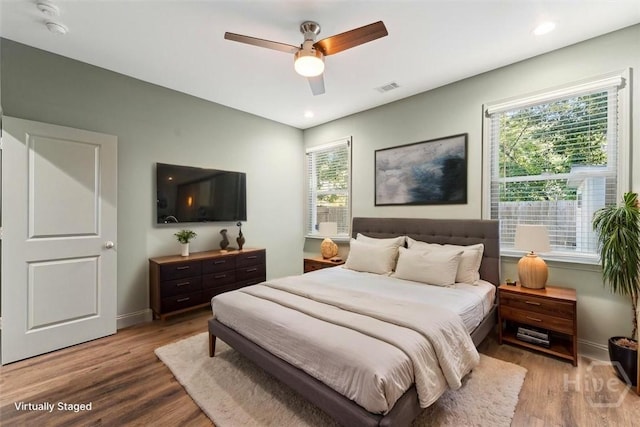 2142 New York Ave, Savannah, GA 31404 - bedroom featuring wood finished floors, baseboards, a ceiling fan, and recessed lighting