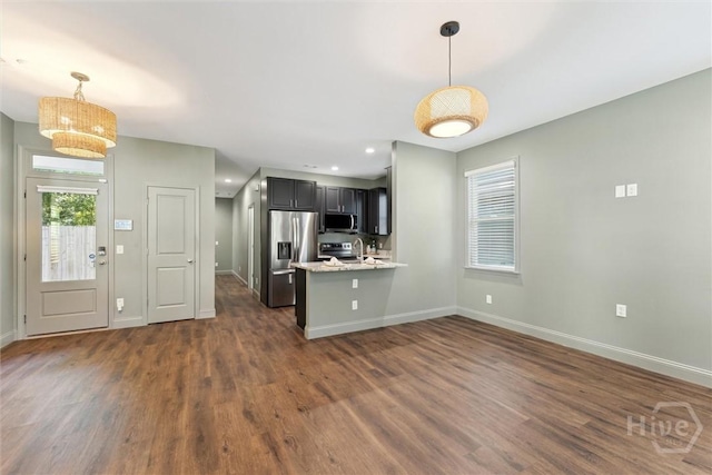 2142 New York Ave, Savannah, GA 31404 - kitchen with appliances with stainless steel finishes, dark wood finished floors, baseboards, and recessed lighting