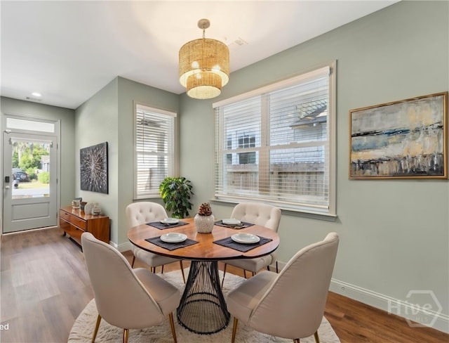 2142 New York Ave, Savannah, GA 31404 - dining space featuring baseboards and wood finished floors