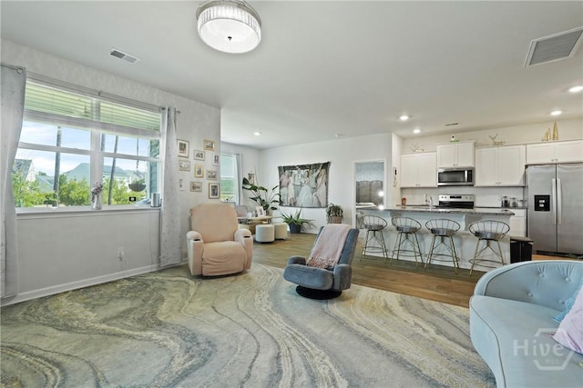 116 Fremont Ln, Pooler, GA 31322 - living room featuring wood finished floors, recessed lighting, and baseboards
