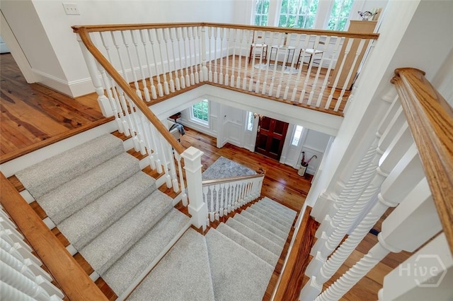36 Belted Kingfisher Ln, Richmond Hill, GA 31324 - staircase with wood finished floors and baseboards