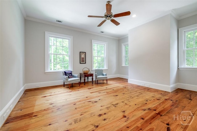 36 Belted Kingfisher Ln, Richmond Hill, GA 31324 - living area with light wood finished floors, baseboards, a ceiling fan, crown molding, and recessed lighting