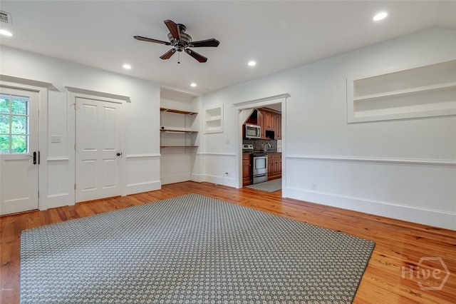 36 Belted Kingfisher Ln, Richmond Hill, GA 31324 - empty room with a ceiling fan, light wood finished floors, baseboards, and recessed lighting